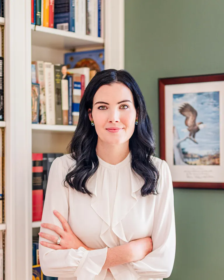 Molly McCann Sanders, President of Eagle Forum Education & Legal, in a library