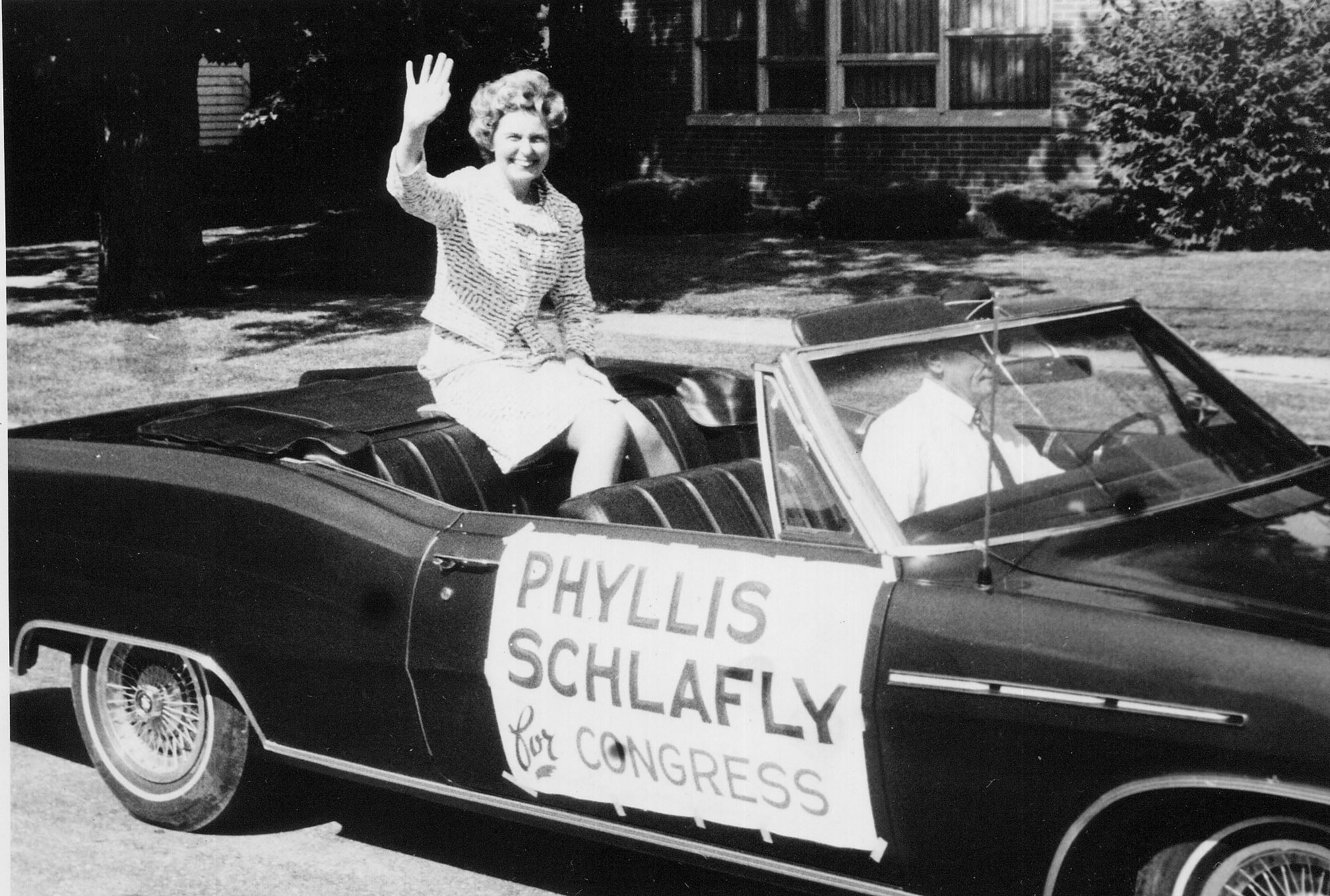 Phyllis Schlafly campaigns for Congress from a decorated car