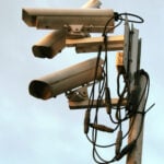 Several surveillance cameras mounted together